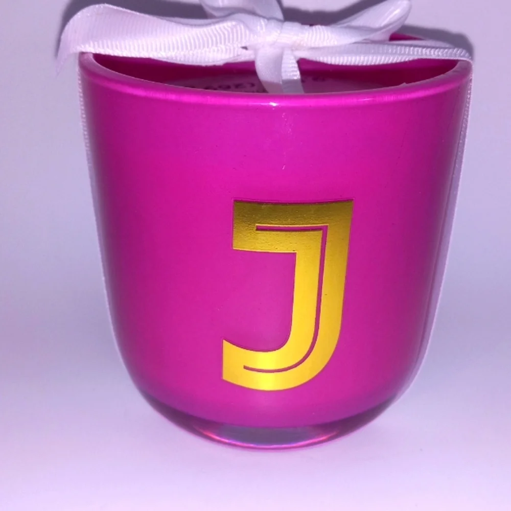 CANDLE WITH GOLD J INITIAL